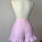 Shorts rosa - vista posteriore
